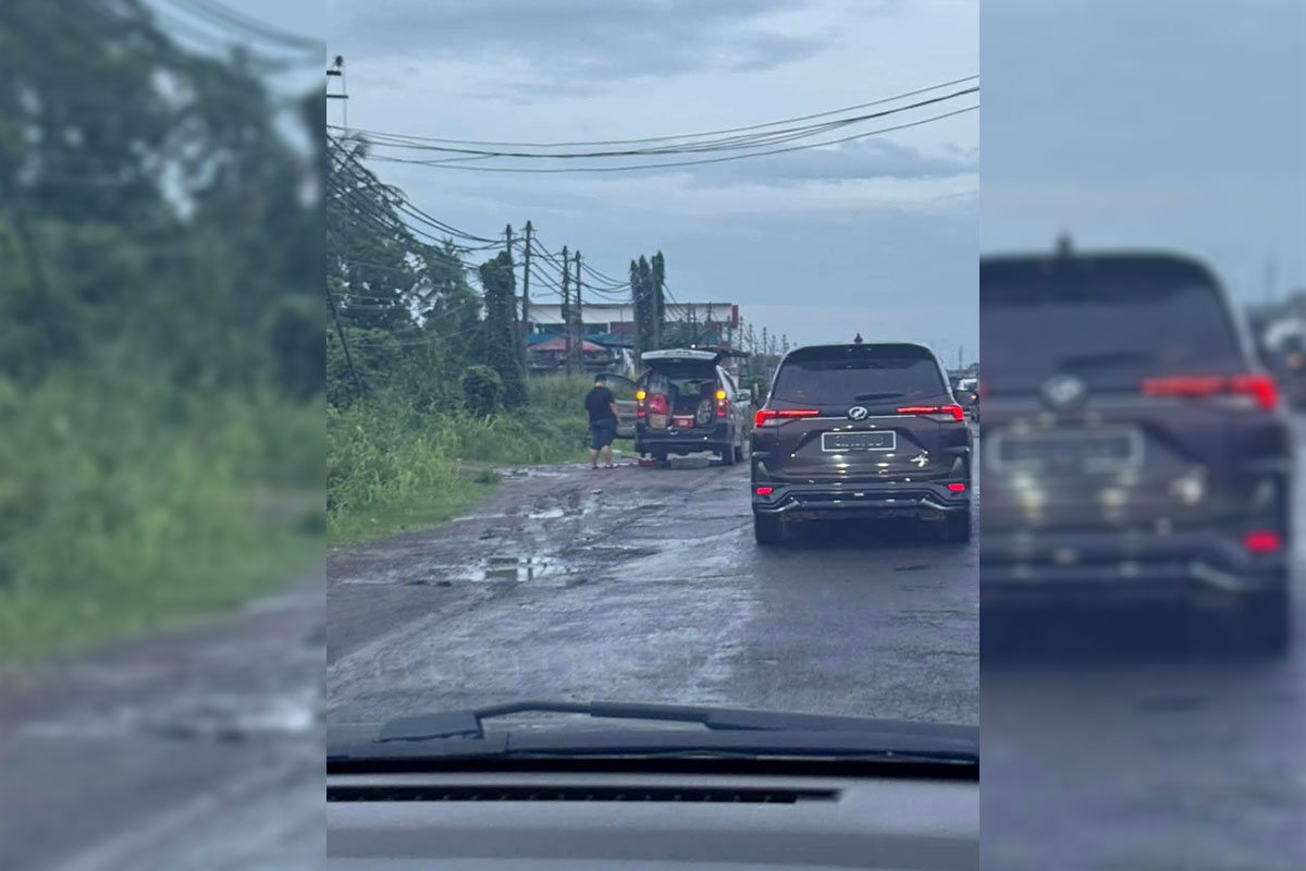 Bad road conditions along the Pan Borneo Highway in Kota Kinabalu, Sabah.